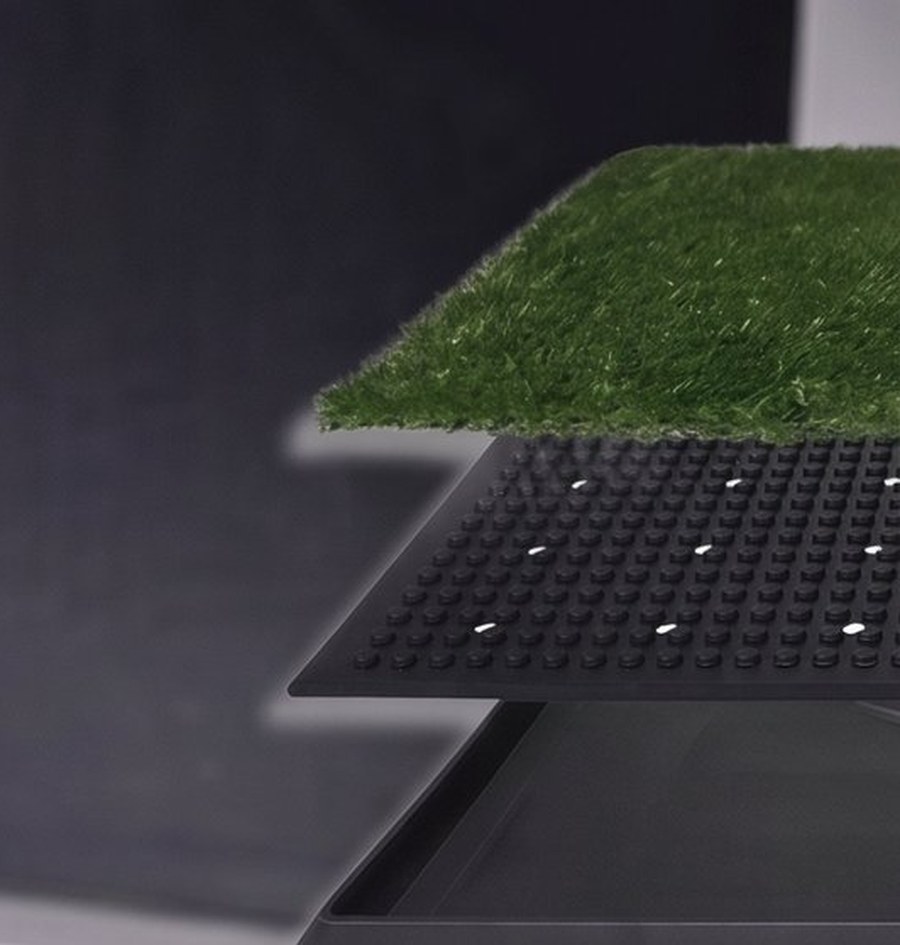 The three layers separated: grass top, drainage grid and collection tray
