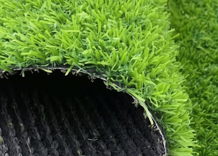 Close-up of the grass blades and the woven backing